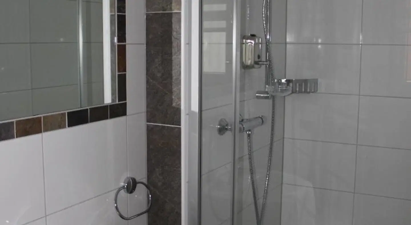 Hotel Tau-Lünne Badezimmer