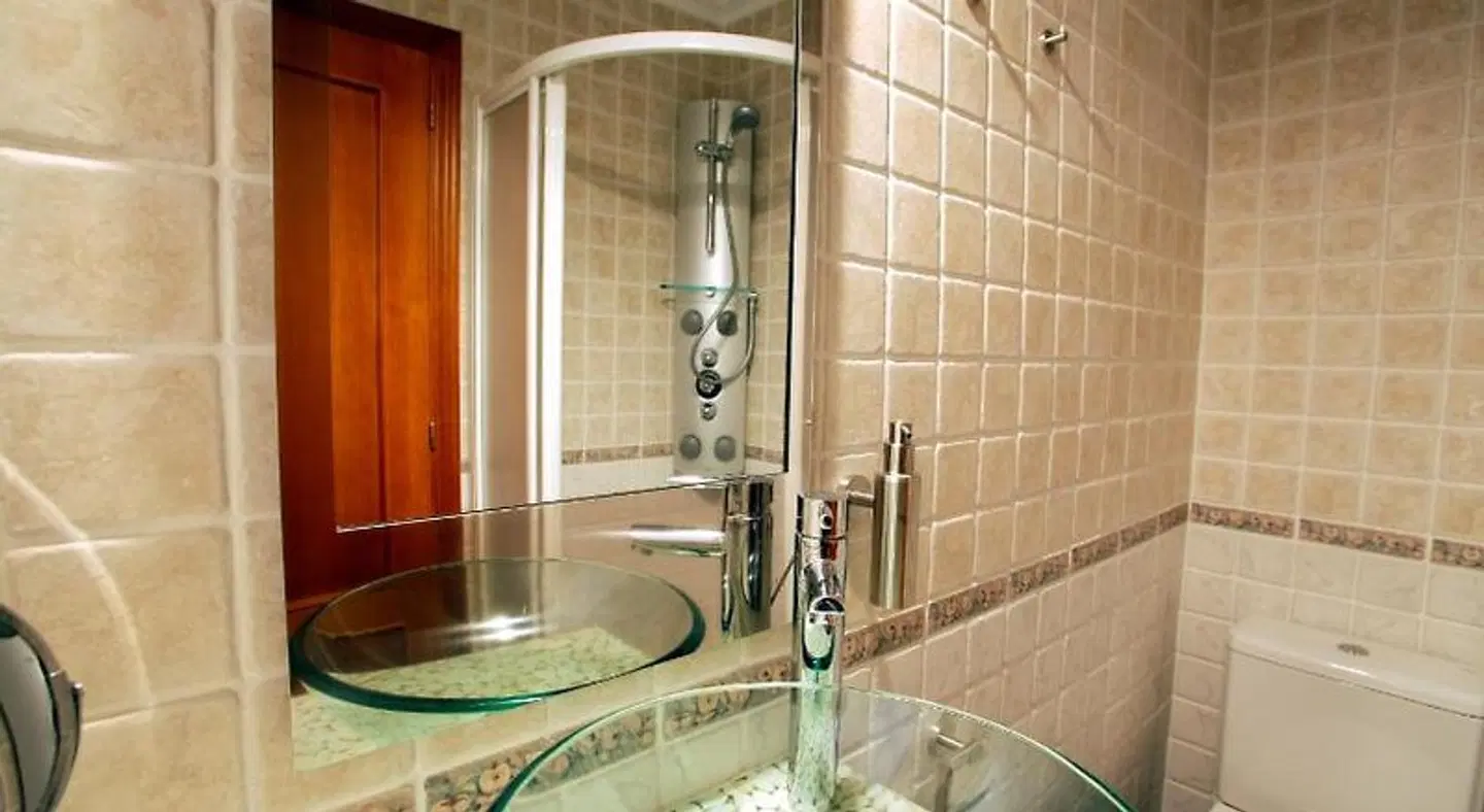 APARTAMENTOS HOTEL 77 Badezimmer