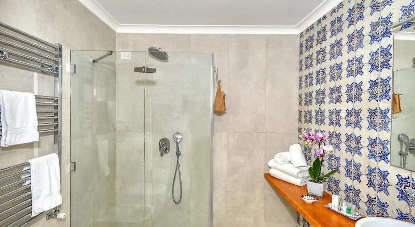 Villa Giardini Luxury Room Badezimmer