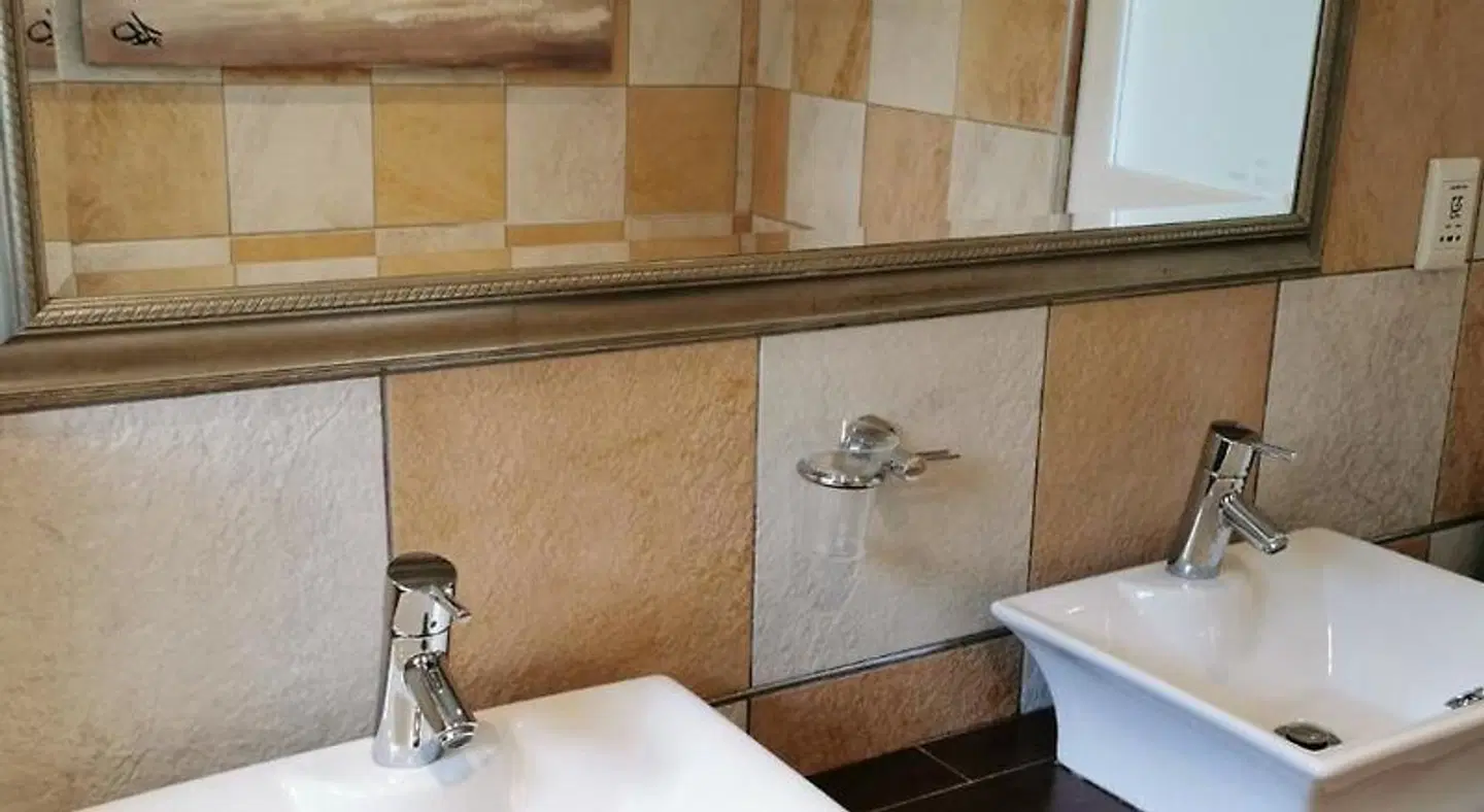 The Hamptons Guest House Badezimmer