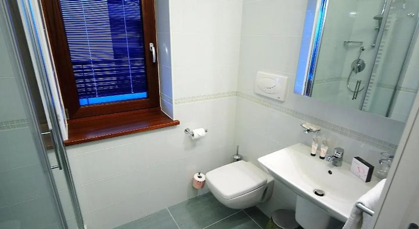 Aparthotel Tiziano Badezimmer