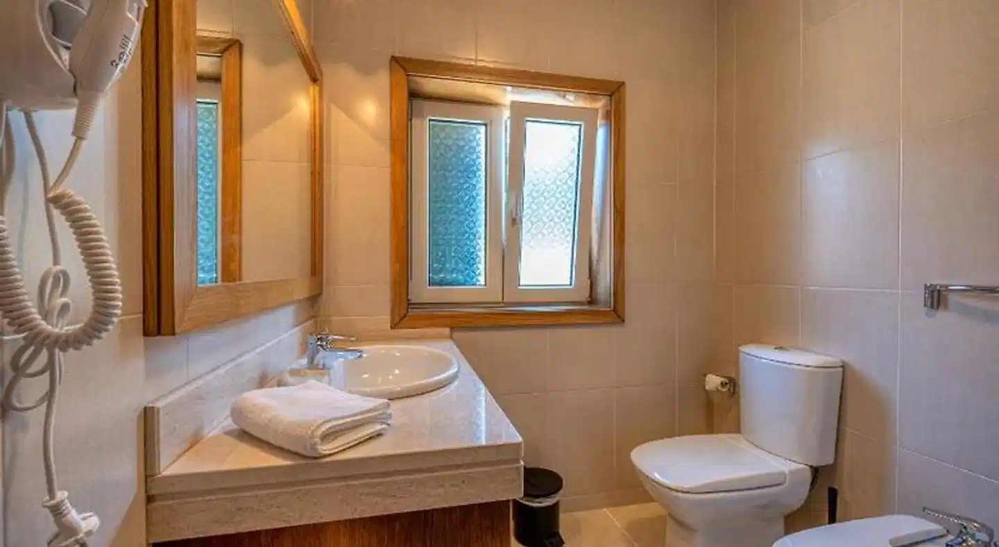 Central Suites Arouca Badezimmer