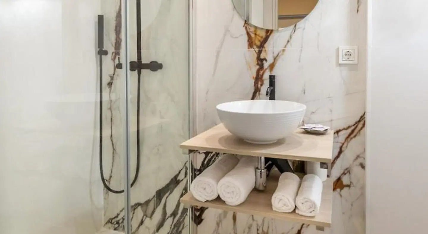 Guest House Plaza Badezimmer