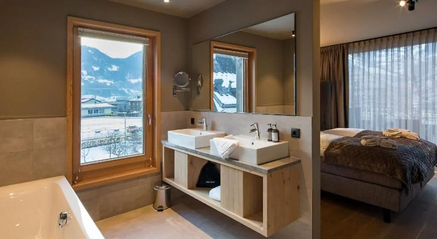 Montafon Suites Schruns by ALPS RESORTS Badezimmer