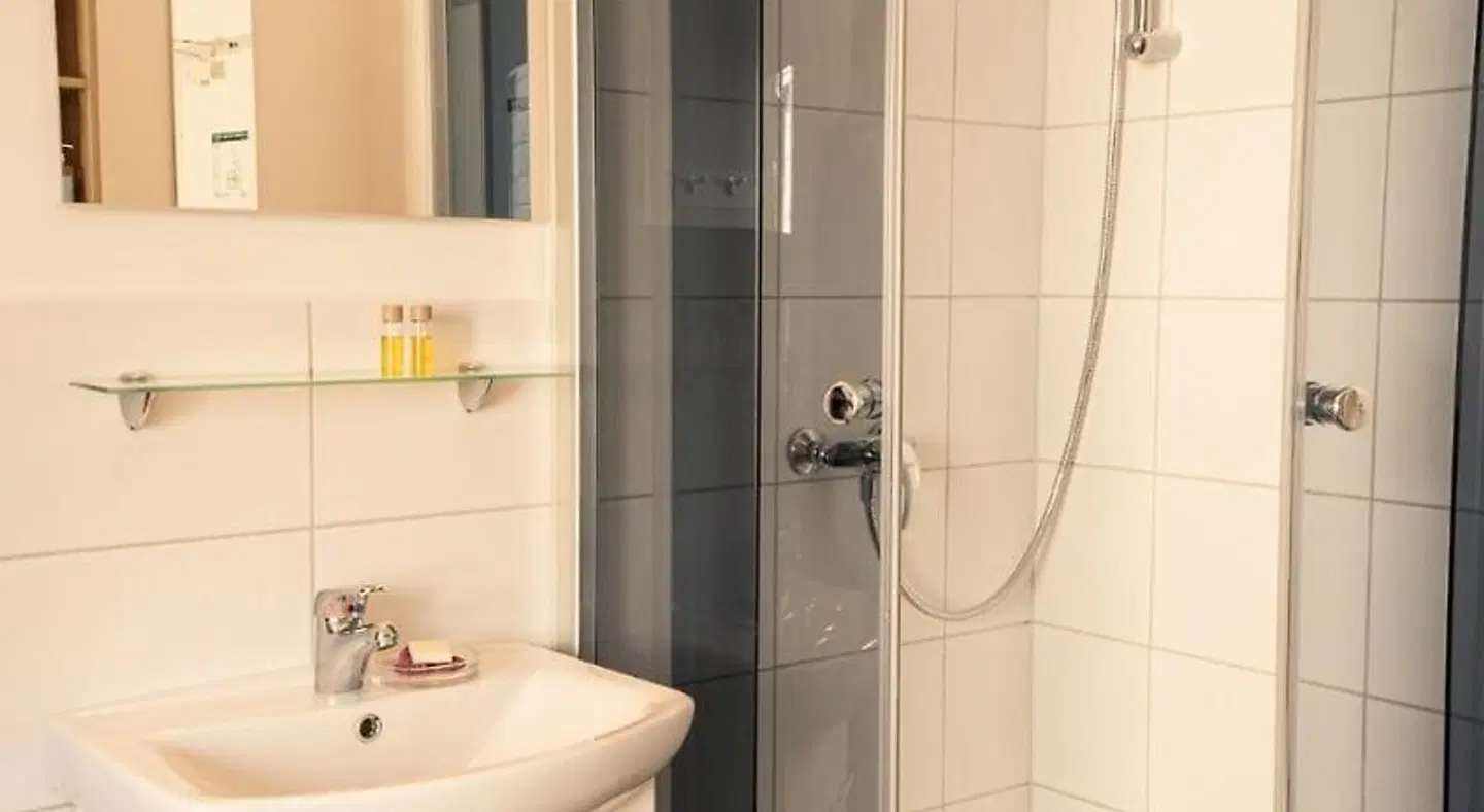 HeimatHerz Hotel Garni Badezimmer
