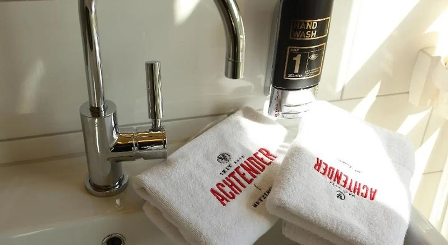 Achtender Badezimmer