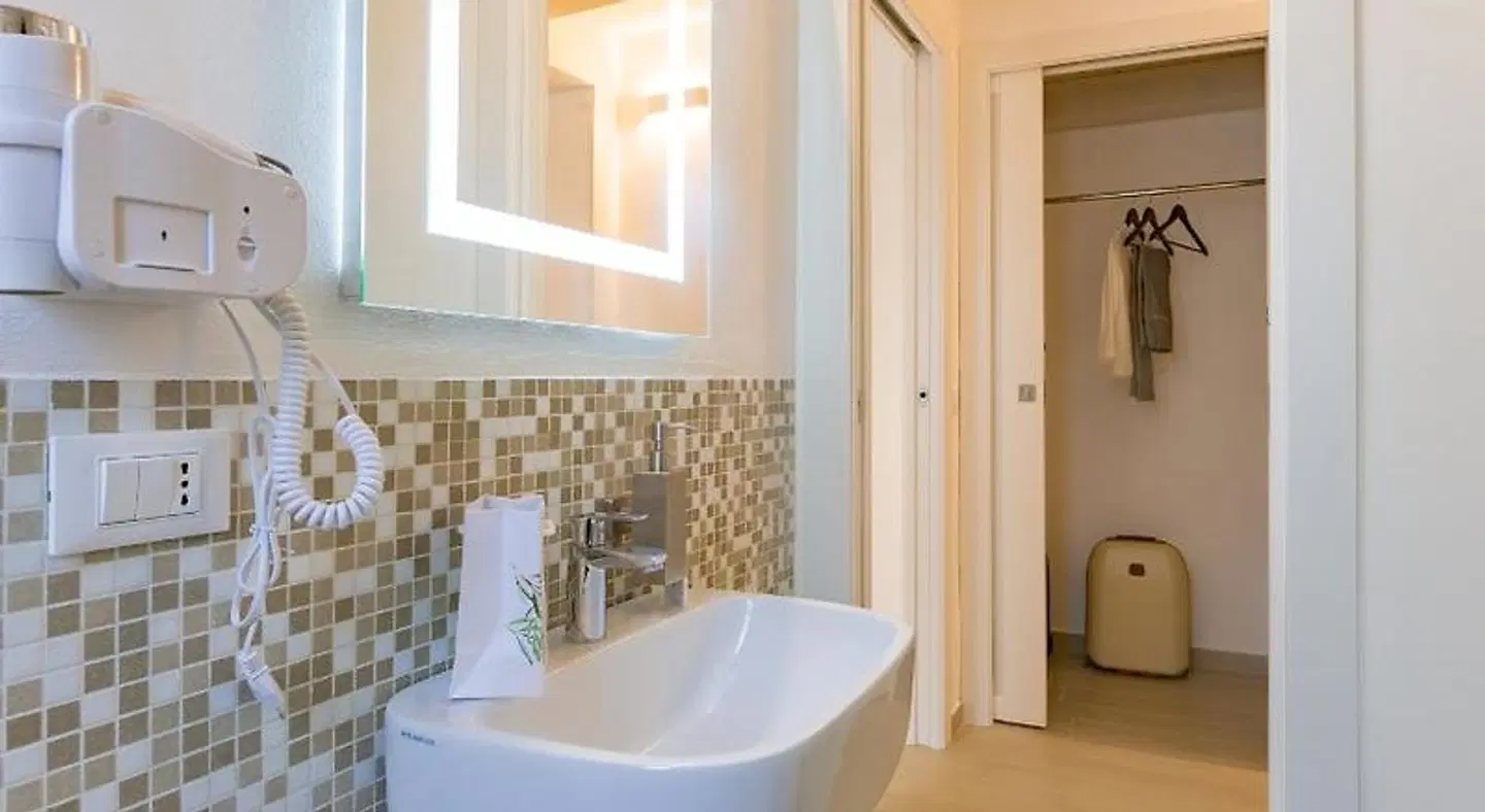 Le Maestranze Deluxe Rooms Badezimmer