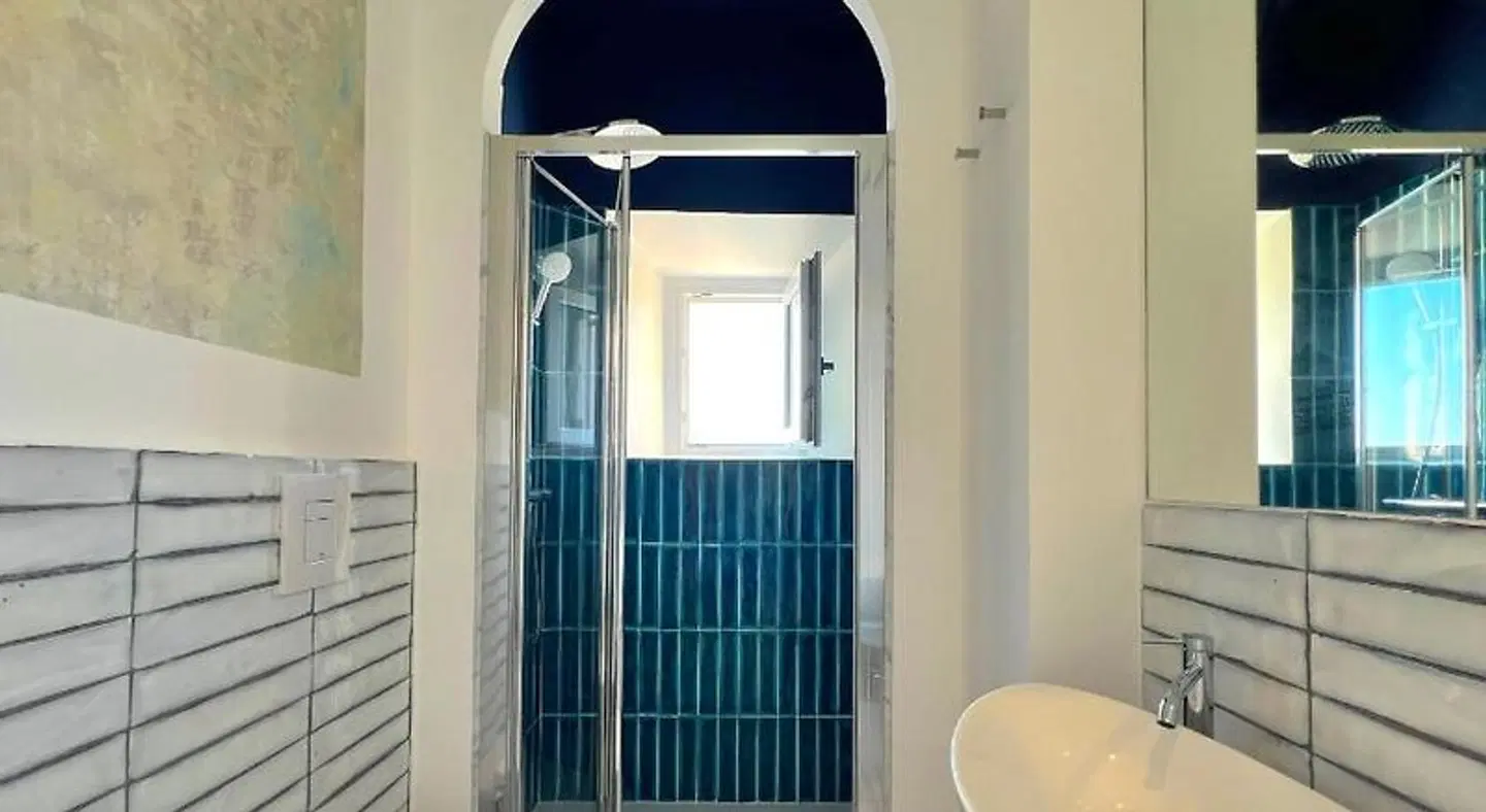 Domus Indomita Apartments Badezimmer