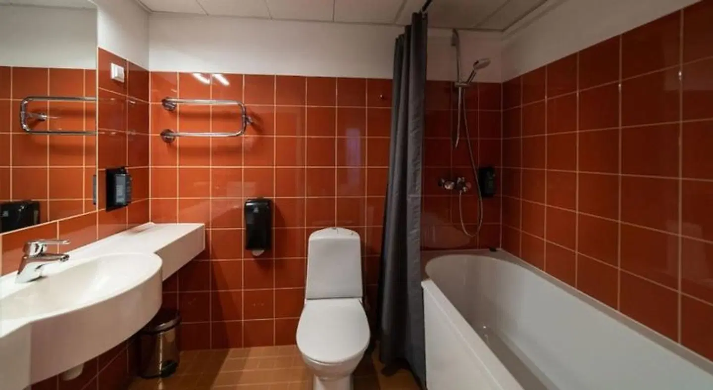 Strand Spa & Conference Hotel Badezimmer