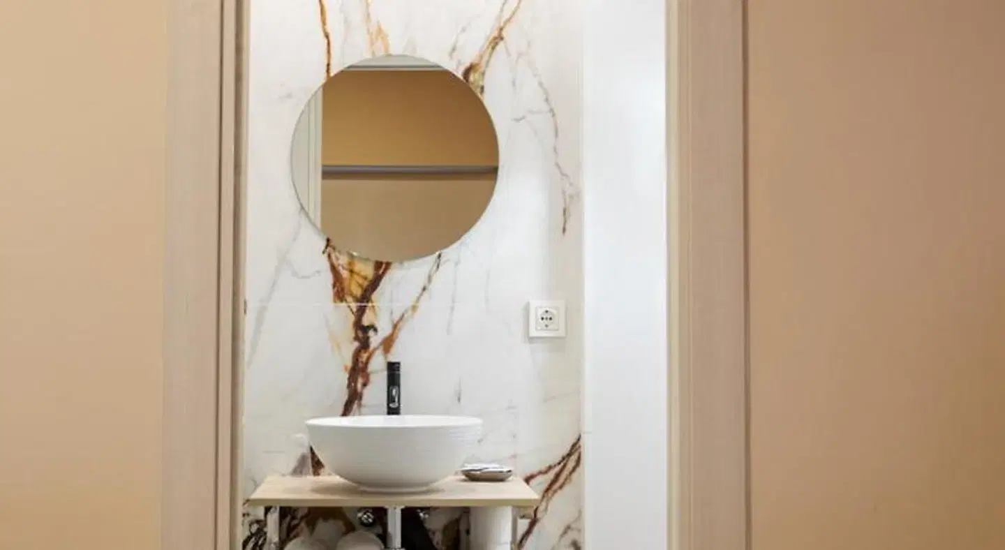 Guest House Plaza Badezimmer