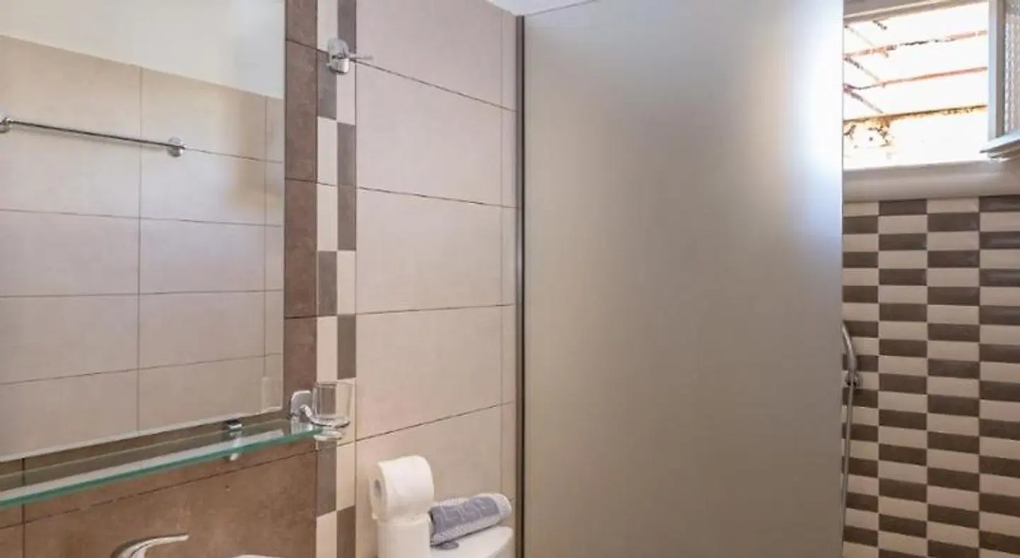 Rapanos Apartments Badezimmer