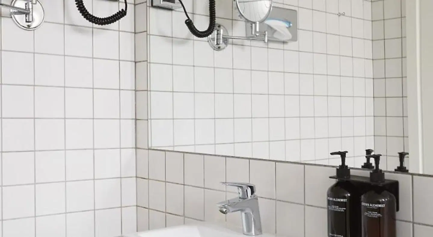 Ascot Apartments Badezimmer