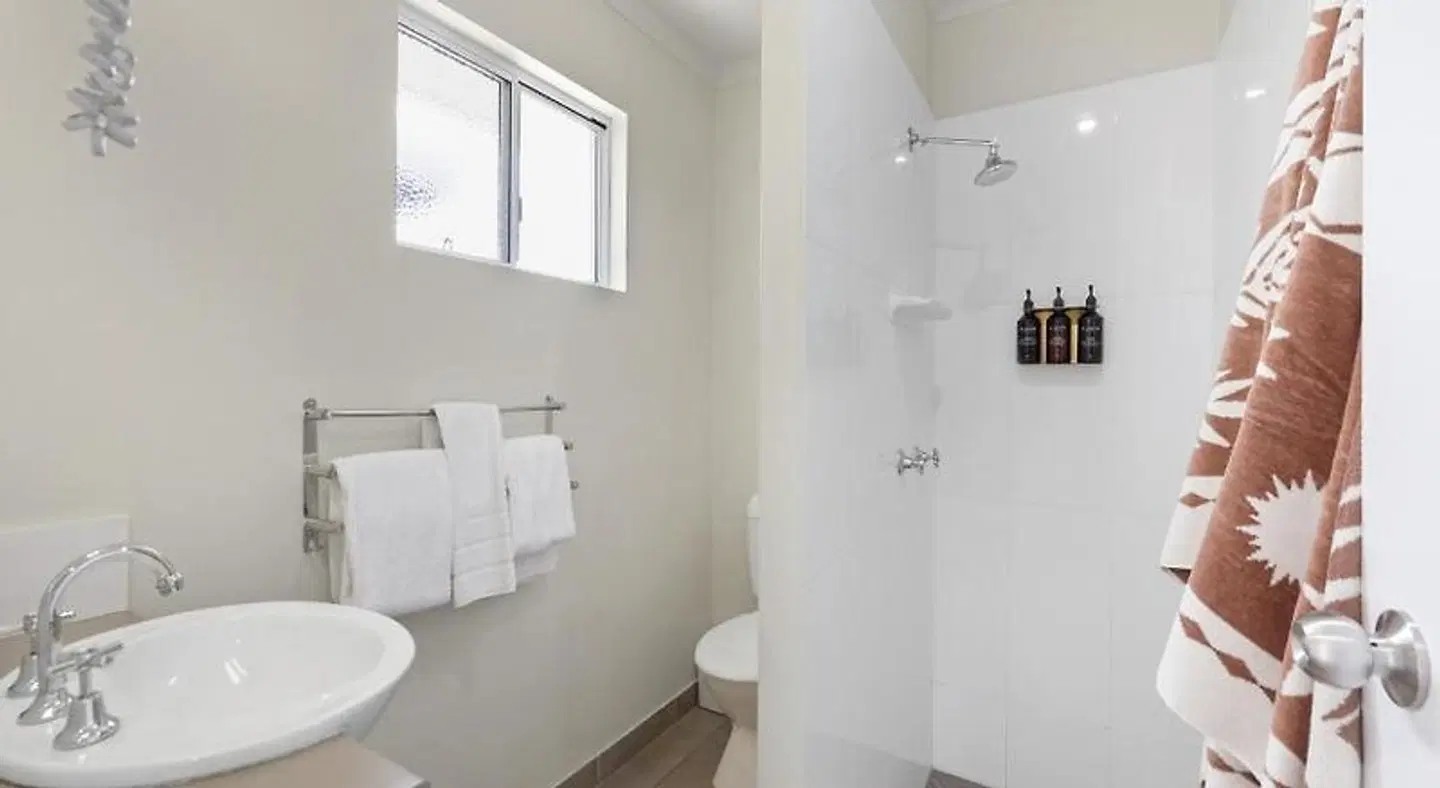 Beachside Boutique Motel Mackay Badezimmer