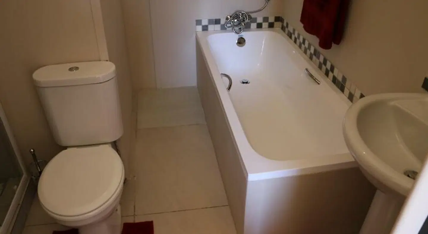 Dante Deo Guesthouse Badezimmer