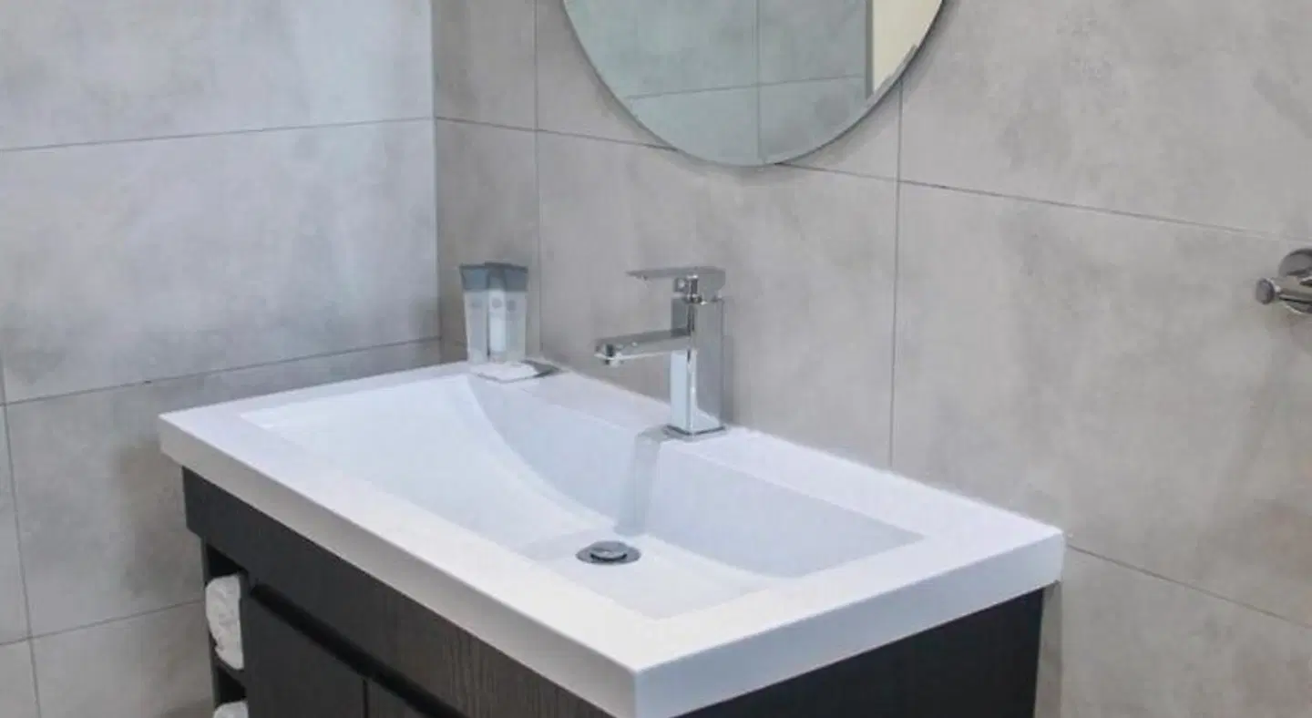 The Cato Suites Hotel Badezimmer