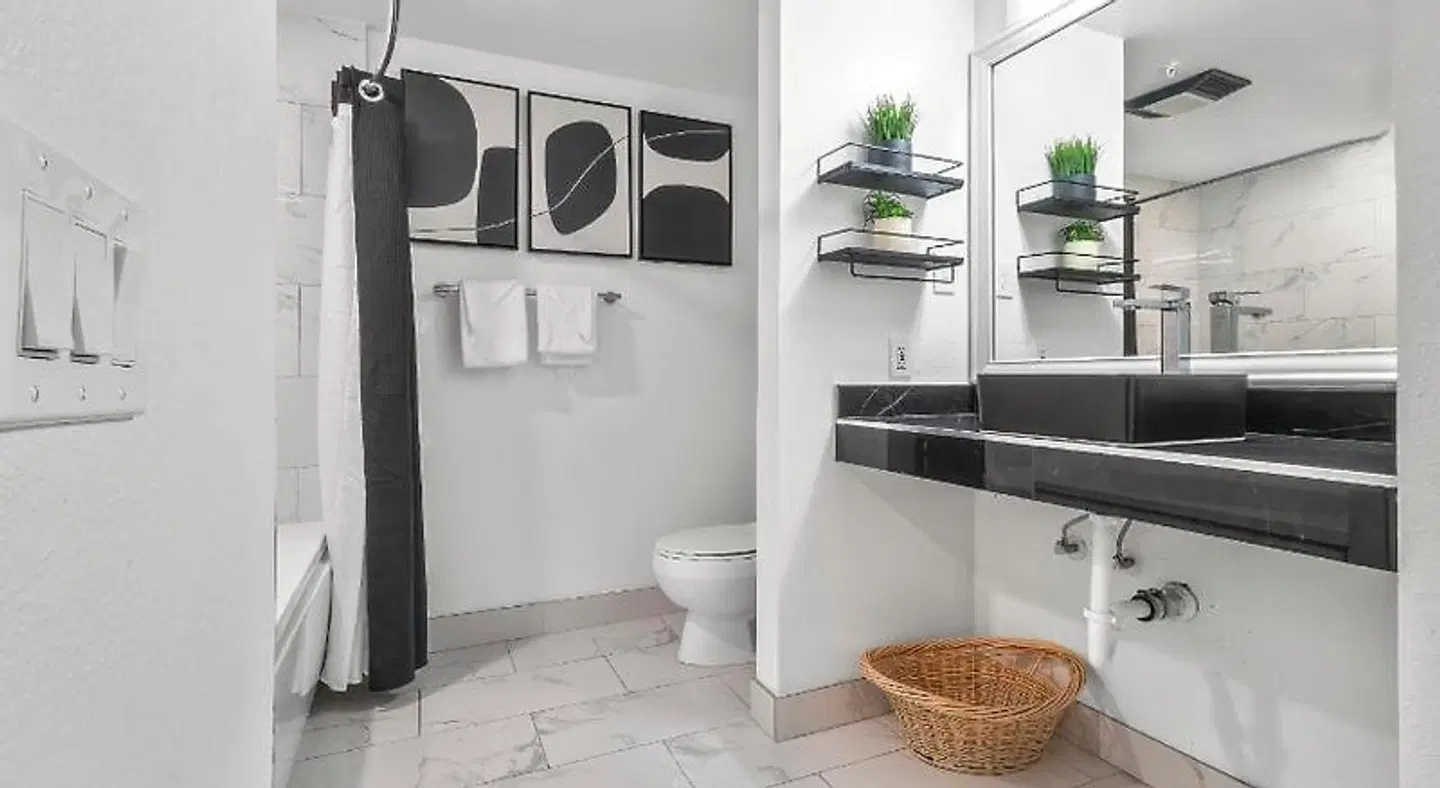 Ascot Suites, an Ascend Collection Hotel Badezimmer