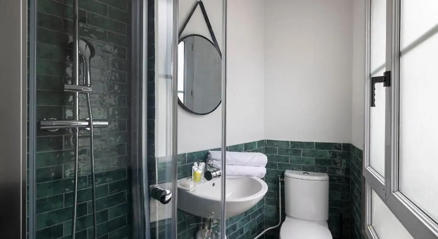 Le Village Hostel & Budget Hotel Badezimmer