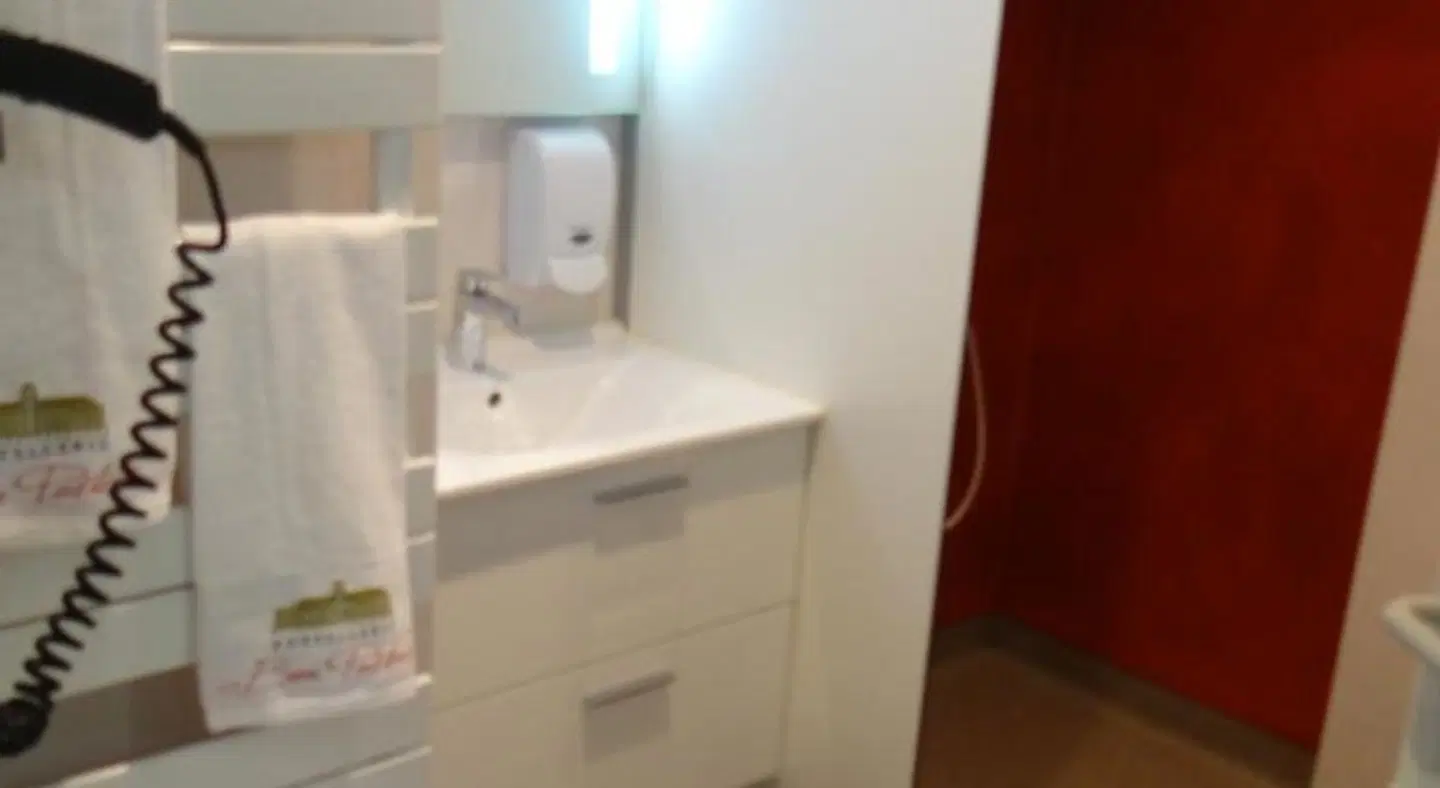 Hostellerie Bon Pasteur Badezimmer