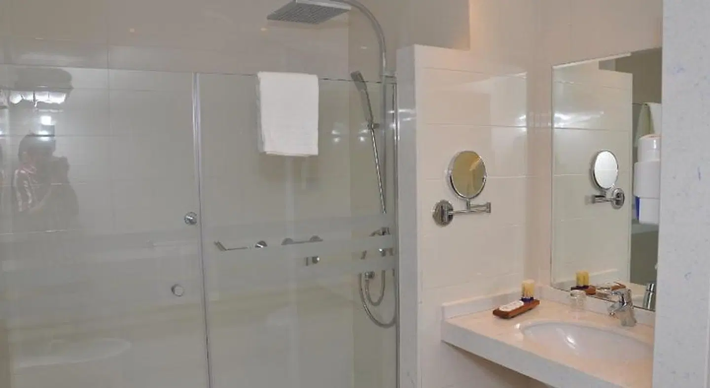 Across Hotels & Spa Badezimmer