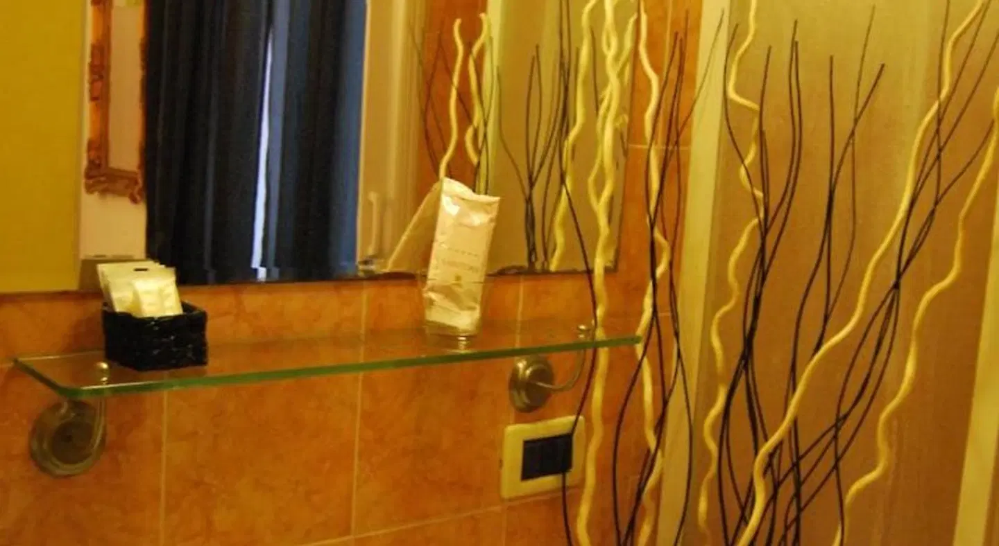Core De Roma Suites Badezimmer