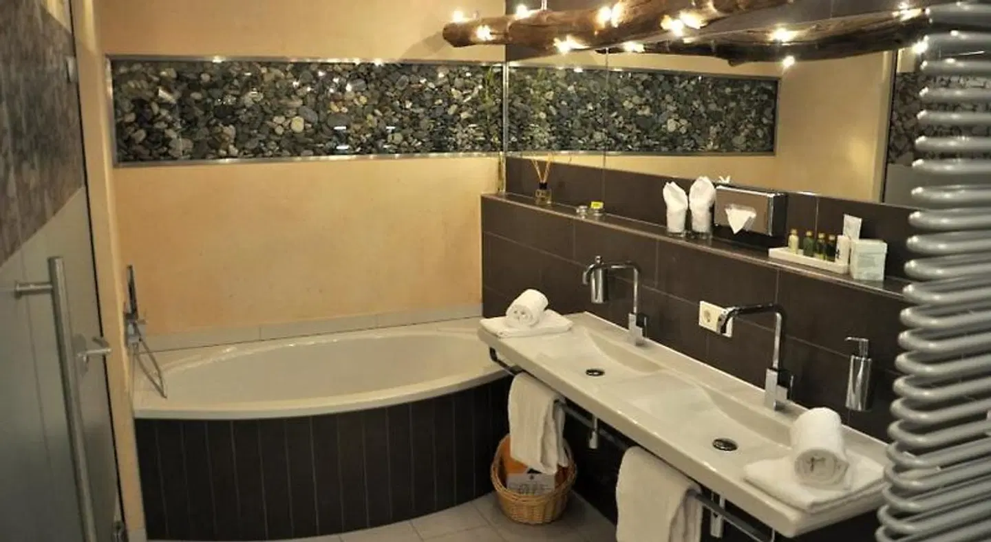 Hotel Alpine Palace Badezimmer