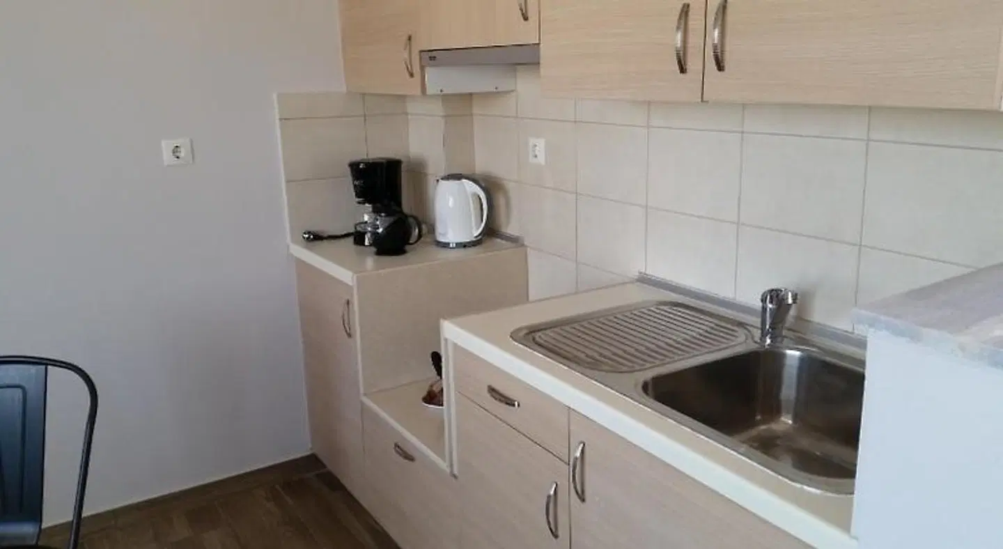 Ria's Deluxe Apartments Badezimmer