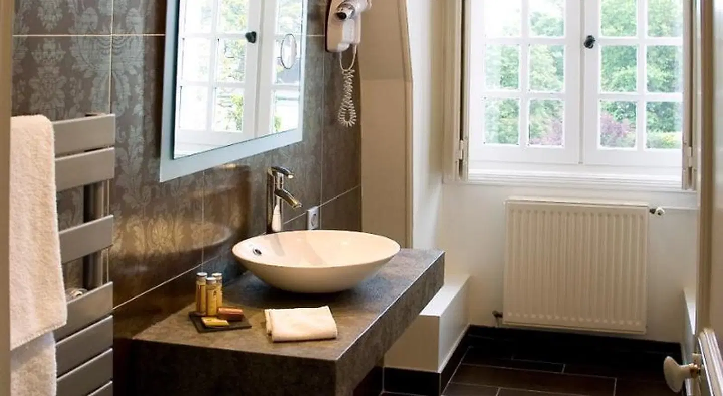 Château De Beaulieu et Magnolia Spa Badezimmer