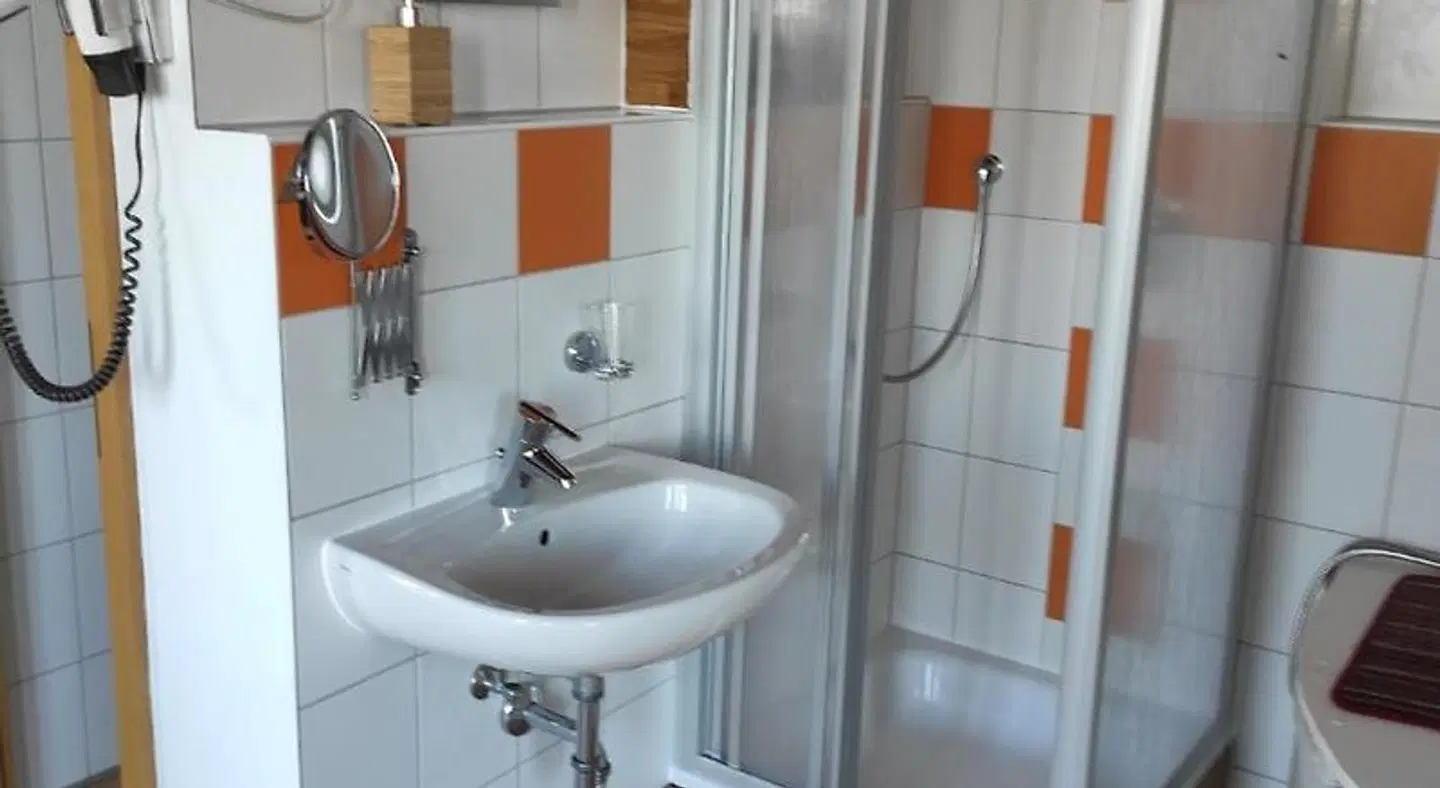 Max Motel Badezimmer