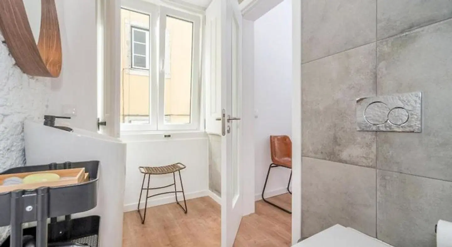 Bairro House Apartments & Suites Badezimmer