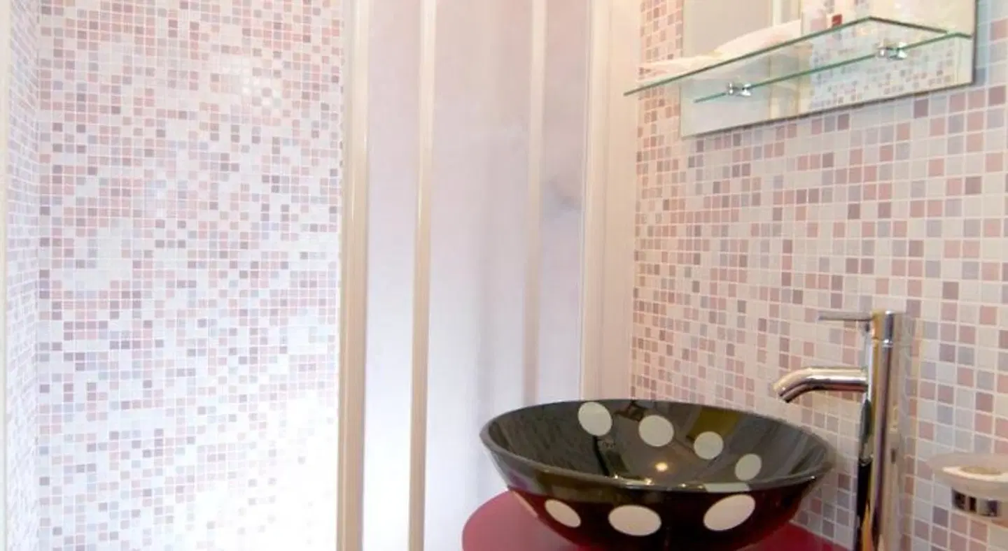 Hotel Velus Badezimmer