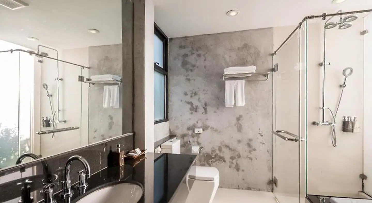 i Tara Resort & Spa Badezimmer