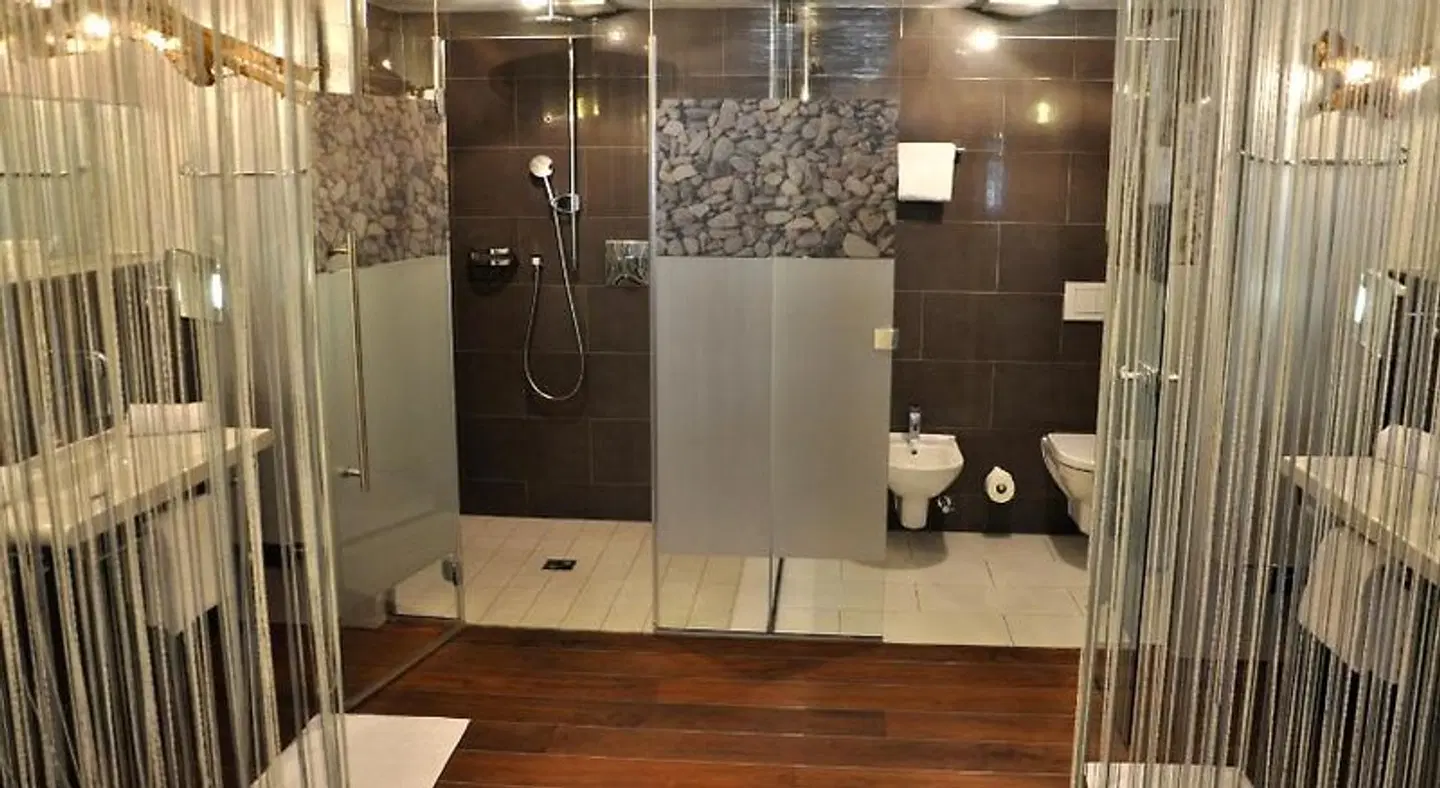 Hotel Alpine Palace Badezimmer