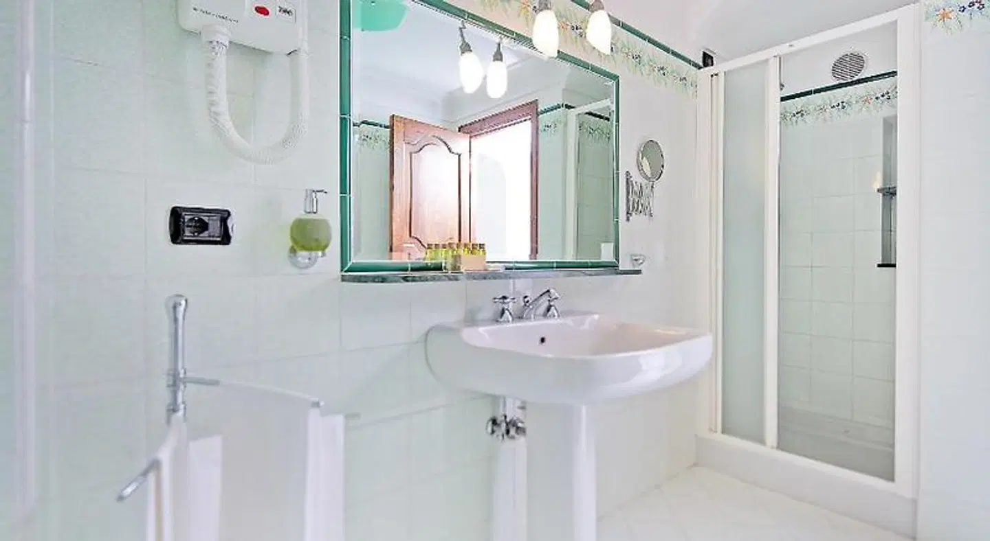 Tramonto d'Oro Badezimmer