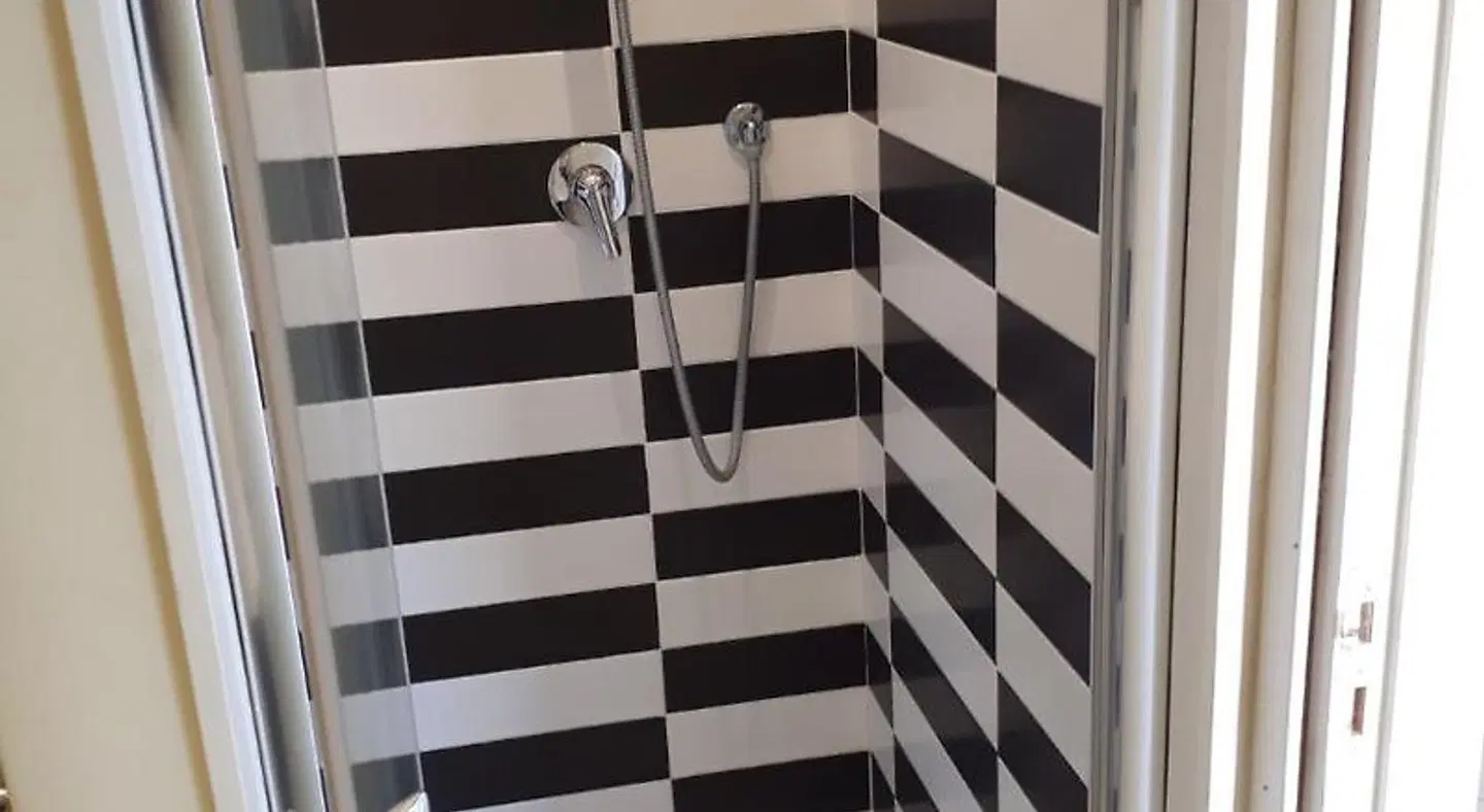 Seven Hostel & Rooms Badezimmer