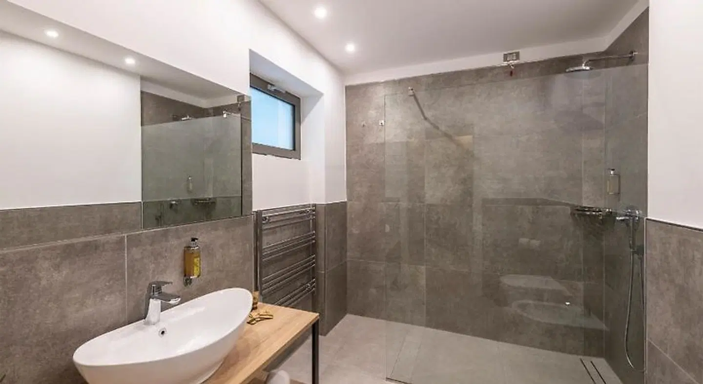 Evo Suites Apartments Badezimmer