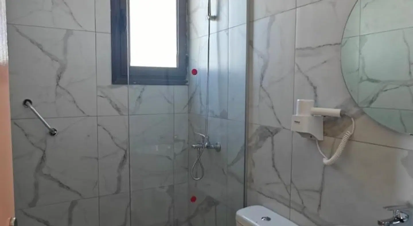 Takis Hotel Apartments Badezimmer