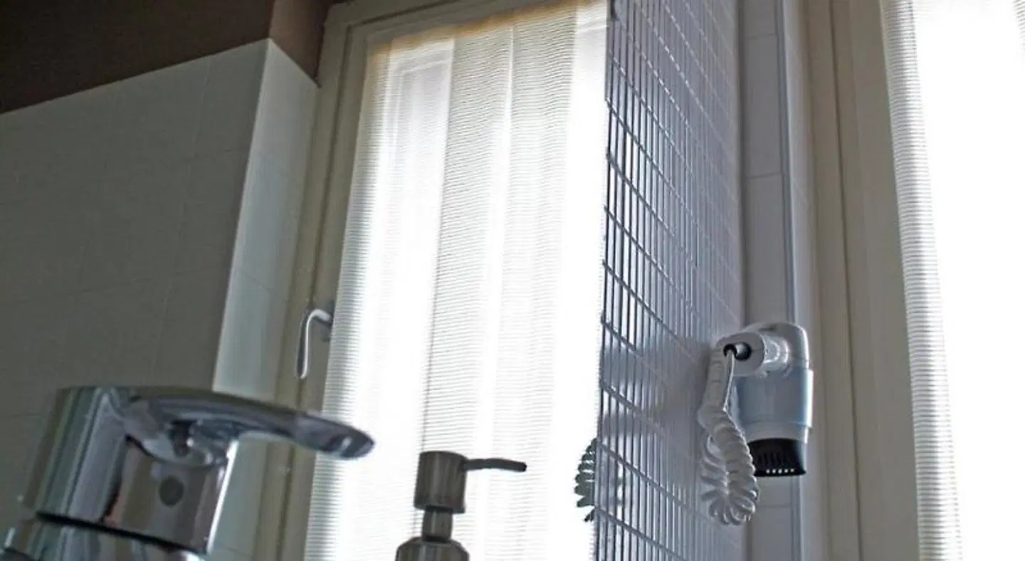 Vialeromadodici Rooms & Apartments Badezimmer