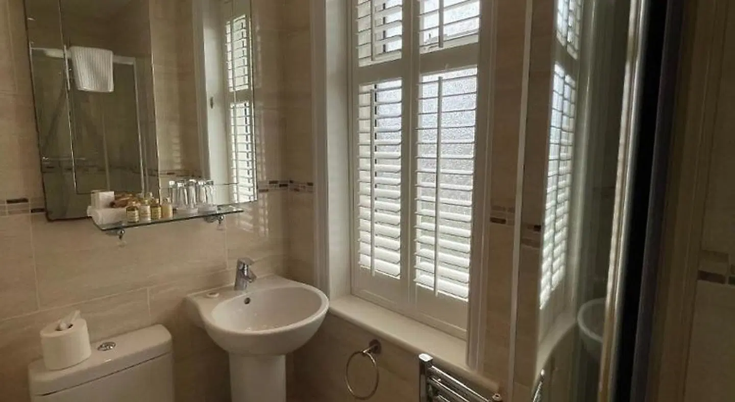 Grosvenor Lodge Guest House Badezimmer