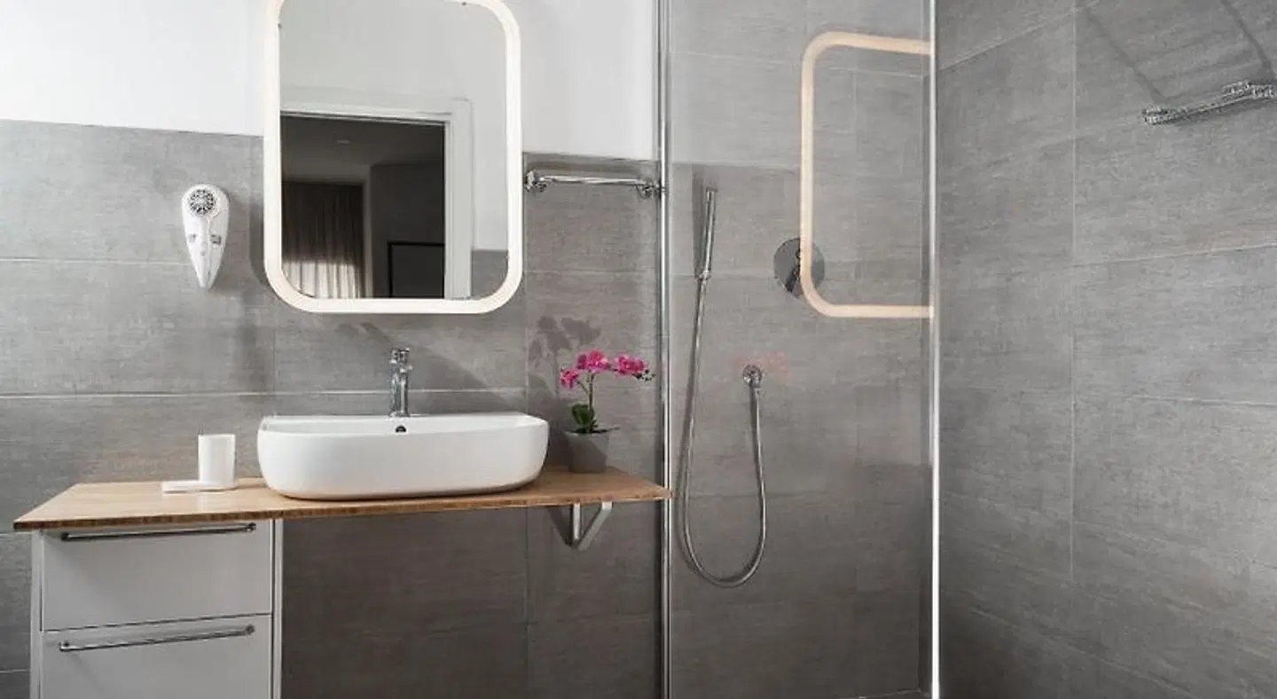 Rivabella Suite Apartments Badezimmer