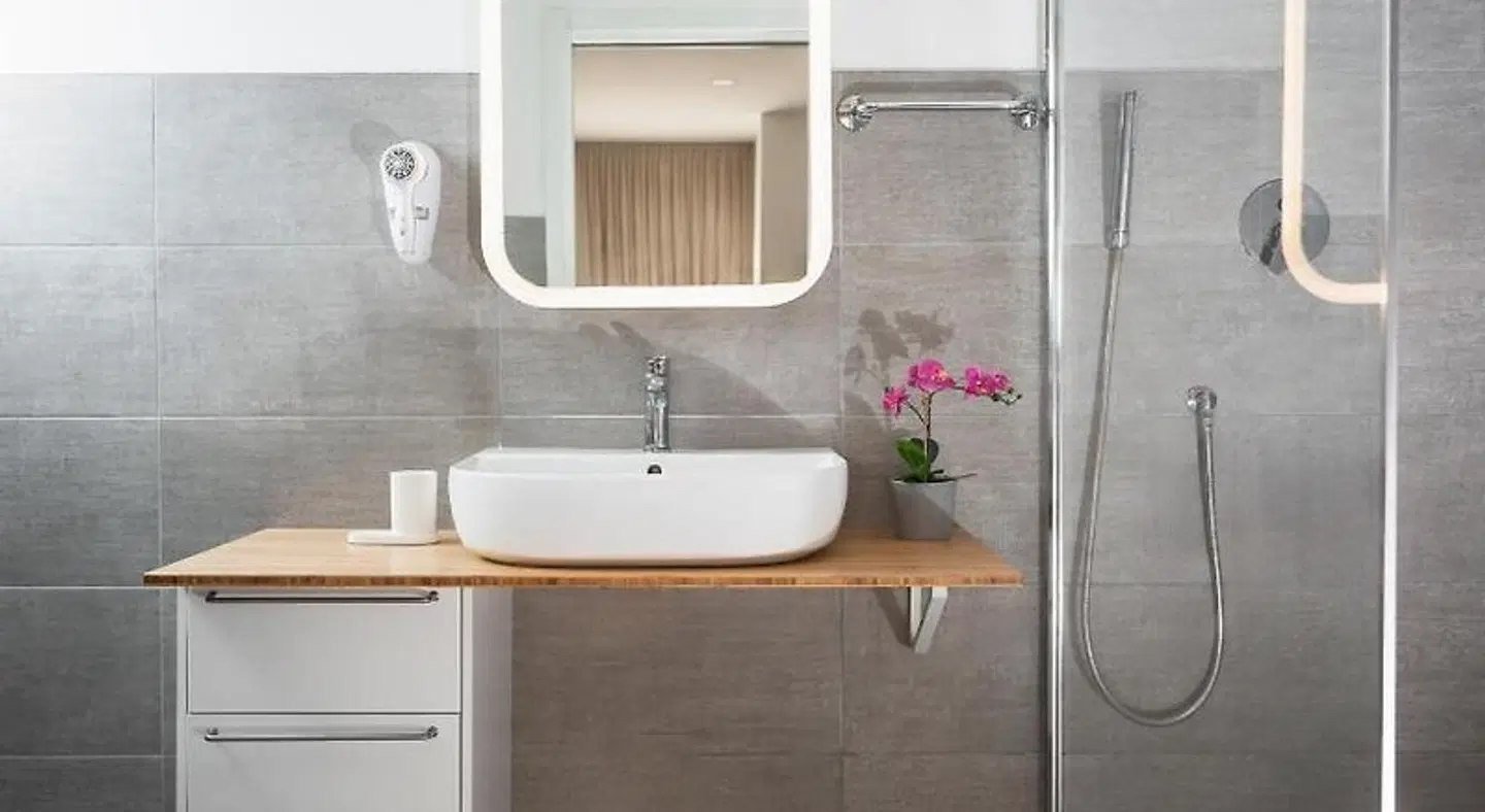 Rivabella Suite Apartments Badezimmer