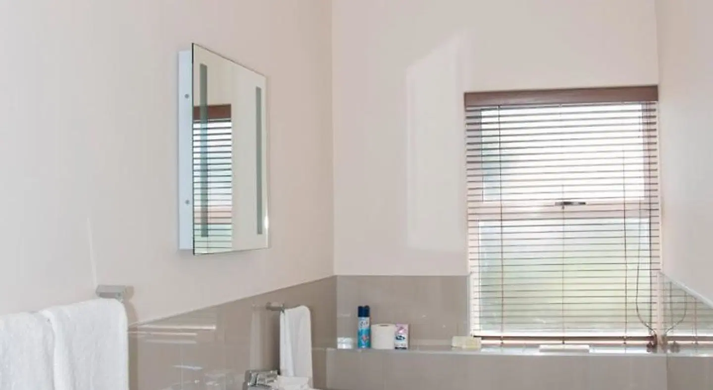 The Sir David Boutique Guest House Badezimmer