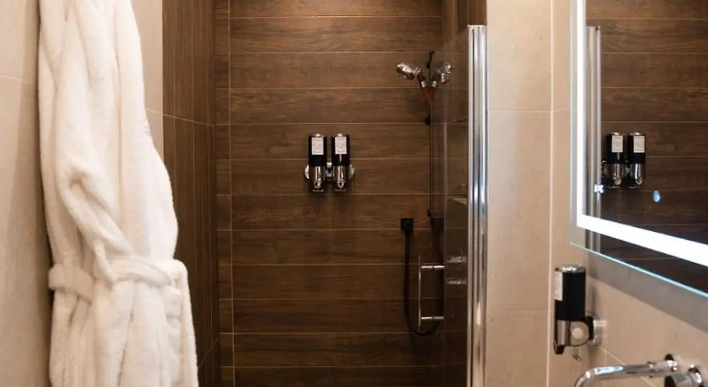 Domo Boutique Hotel Badezimmer