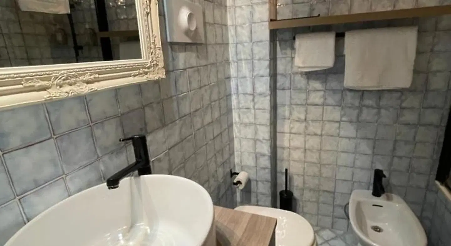 Le camere di Bsuites Badezimmer