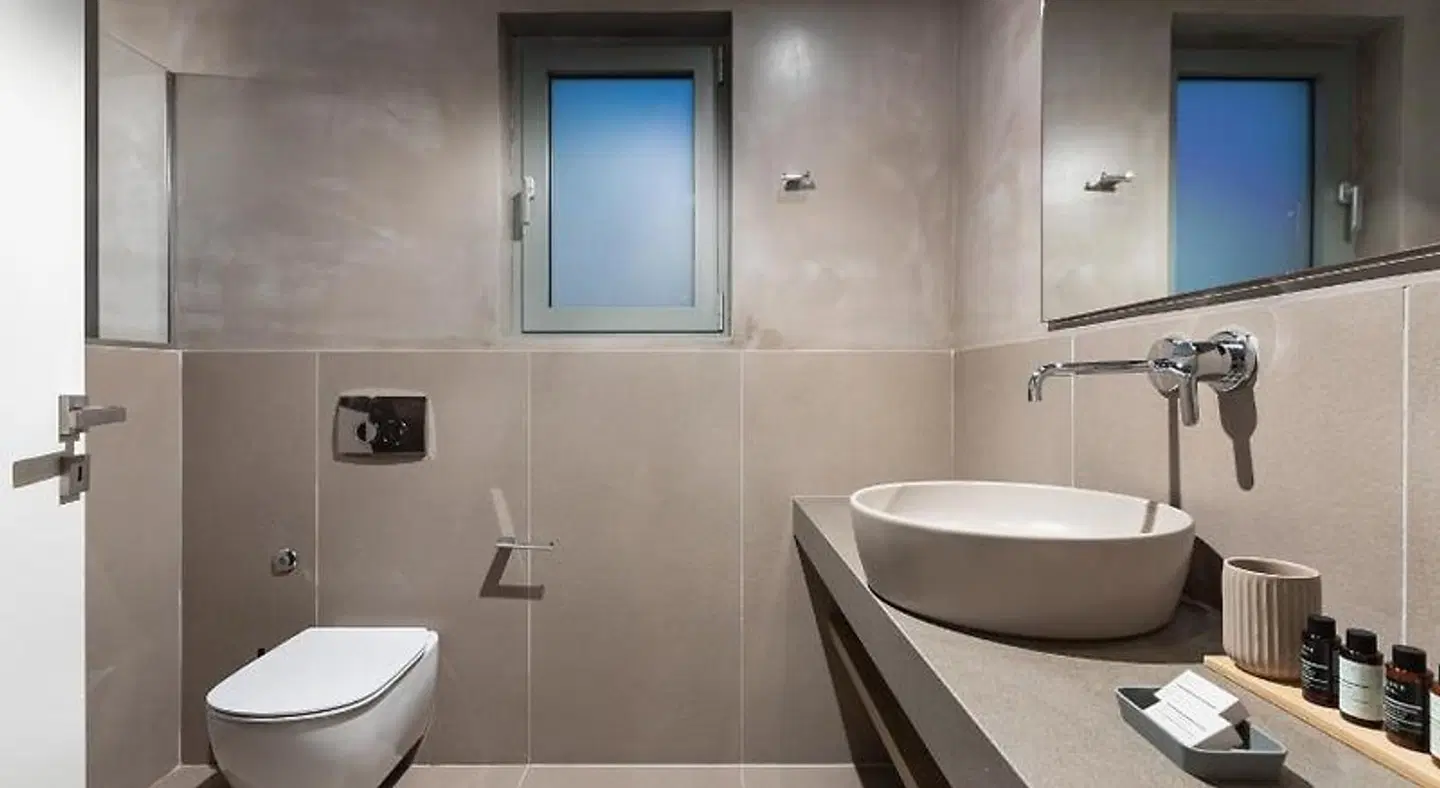 Callisto Seaside Homes & Suites Badezimmer
