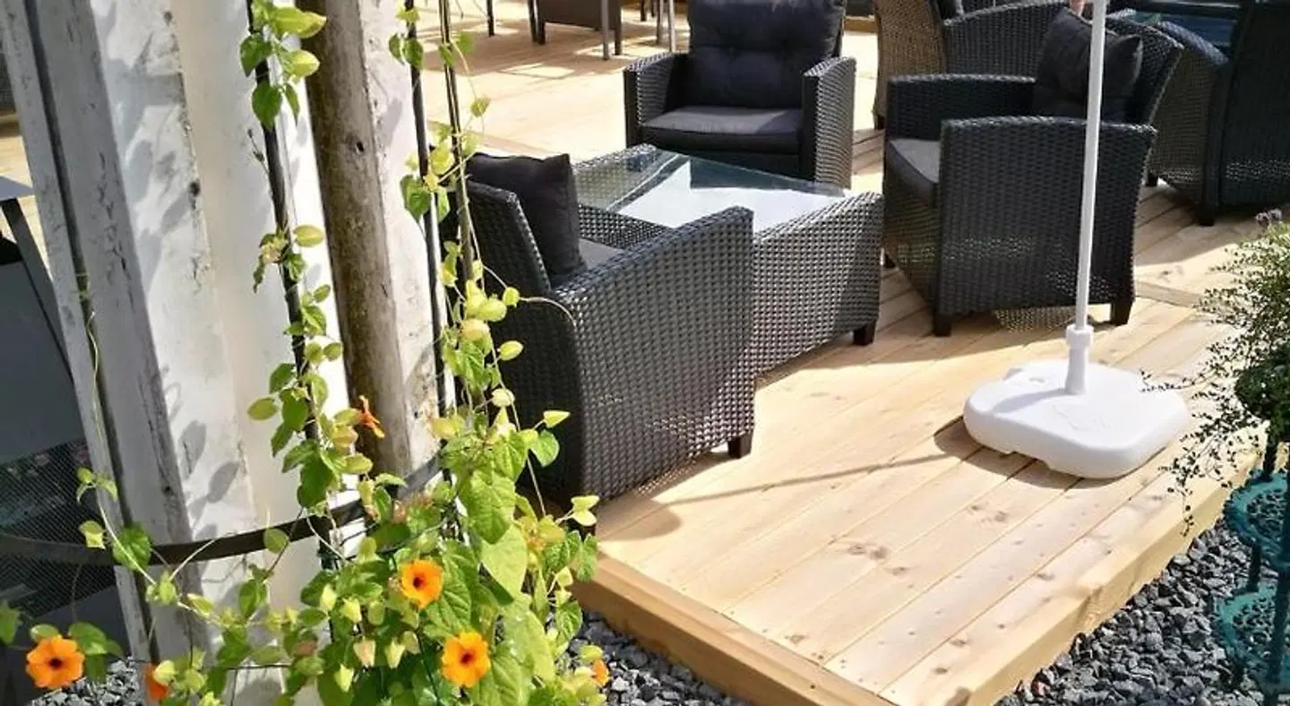 Hotell Floras Trädgård Terrasse