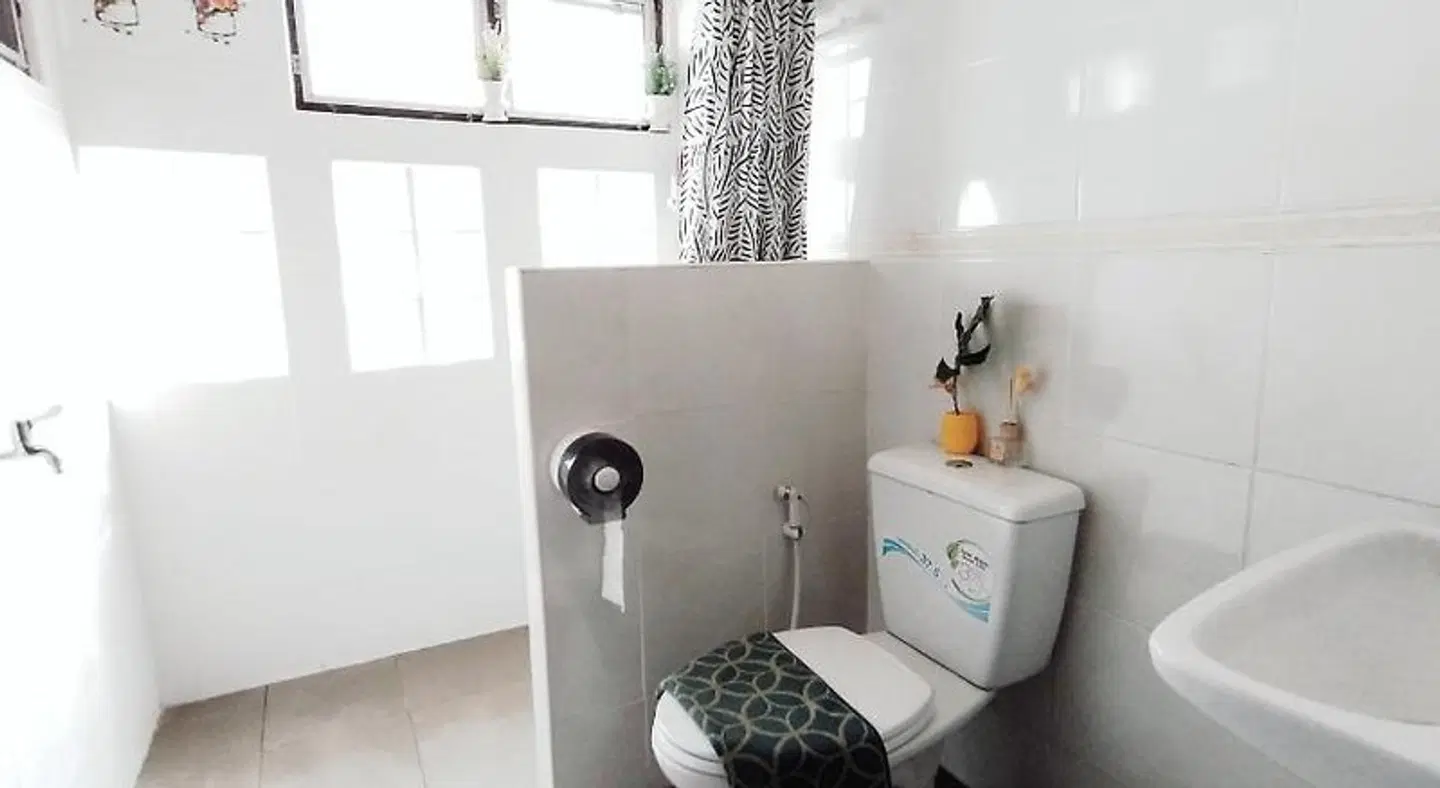 Green Riverside Homestay Badezimmer