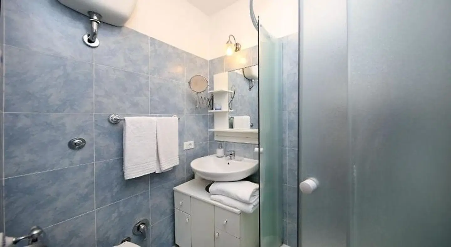 Tibullo Guesthouse Badezimmer