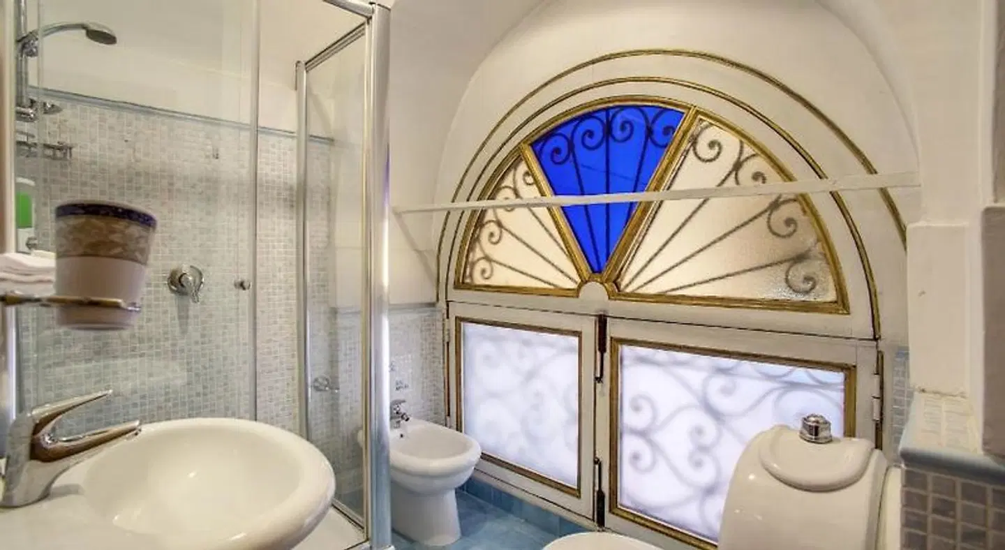 Navona Gallery & Garden Suites Badezimmer