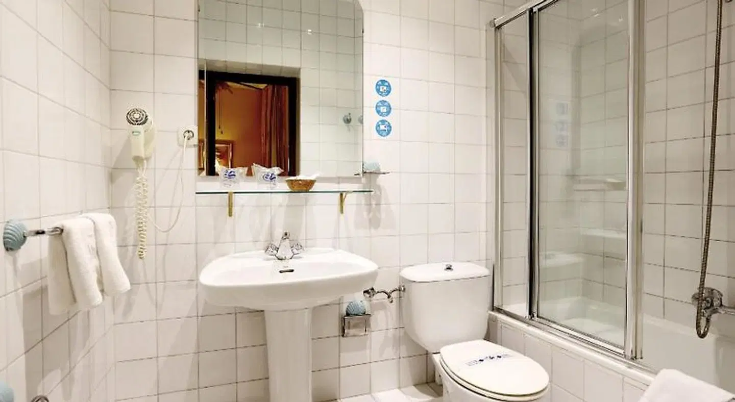Hostal Macarena Badezimmer