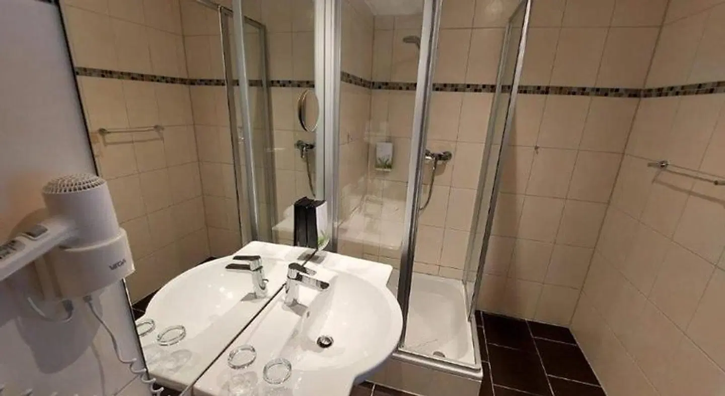 Panoramahotel Am Rosengarten Badezimmer
